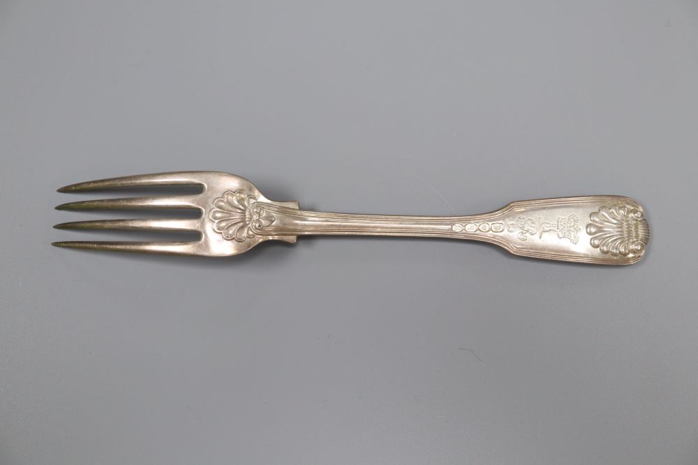 A matched set of twenty two George IV and later silver fiddle, thread and shell pattern dessert forks